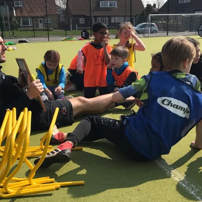 BDM Sports coach with children at holiday camp